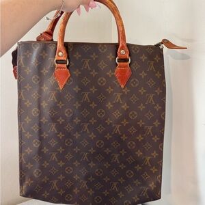 Louis Vuitton Brown Monogram Handbag with Red Accents
